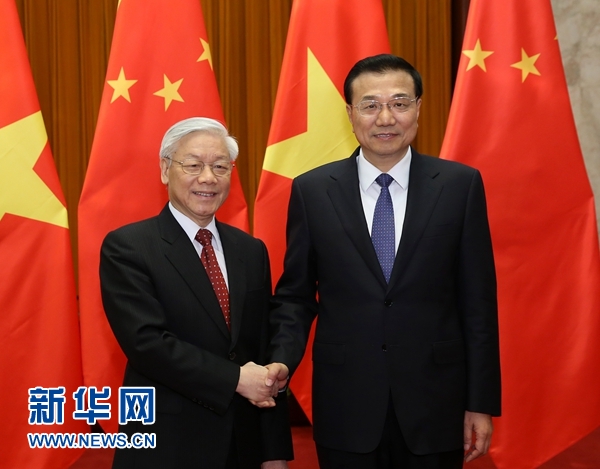 4月8日，中共中央政治局常委、国务院总理李克强在北京人民大会堂会见来华进行正式访问的越共中央总书记阮富仲。 新华社记者庞兴雷摄