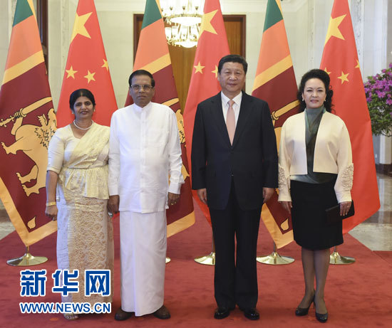这是习近平和夫人彭丽媛同西里塞纳夫妇合影。新华社记者李学仁摄 这是习近平和夫人彭丽媛同西里塞纳夫妇合影。新华社记者李学仁摄